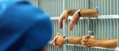 detenuti sbarre cella